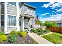 Inviting front porch with manicured landscaping and decorative details at 1932 Sandhurst Dr, Castle Rock, CO 80104
