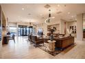Spacious and modern lobby features tile floors, designer lighting, comfortable seating areas, and access to glass doors at 20 Wilcox St # 518, Castle Rock, CO 80104