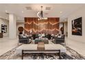 Inviting condo lobby featuring stylish seating, decorative lighting, and a unique wooden feature wall for a modern aesthetic at 20 Wilcox St # 518, Castle Rock, CO 80104