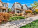 Charming two-story home with a well-maintained lawn at 1140 S Sherman St, Denver, CO 80210