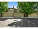 Multiple individual garages showing a community of townhomes at 11704 Elk Head Range Rd, Littleton, CO 80127