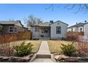 Charming single-story home with a well-maintained front yard and welcoming curb appeal at 1705 S Downing St, Denver, CO 80210