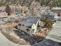 Overhead view of commercial property with parking, professional landscaping, and mountain views at 710 6Th St, Georgetown, CO 80444