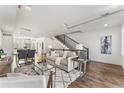 Bright living room with hardwood floors and a comfortable sofa at 163 S Harrison St, Denver, CO 80209