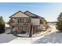 Two-story home with walkout basement and backyard access at 7260 Fallon Cir, Castle Rock, CO 80104