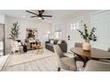 Bright and airy living room with hardwood floors and modern furniture at 2360 S Julian St, Denver, CO 80219