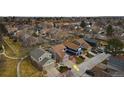 Aerial view of a neighborhood showcasing the property's location within a residential area at 8737 Garrison Ct, Arvada, CO 80005