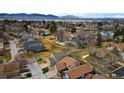 Aerial view of a neighborhood showcasing the property's location and nearby community amenities at 8737 Garrison Ct, Arvada, CO 80005
