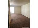 Spacious living room featuring neutral walls and plush carpeting at 2355 E Geddes Ave # G24, Centennial, CO 80122