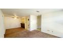 A cozy living room space featuring plush carpeting at 2355 E Geddes Ave # G24, Centennial, CO 80122