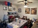 Dining area with a table set for a casual meal at 2218 Coronado N Pkwy # B, Denver, CO 80229