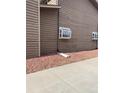 Tan siding on side of townhome at 841 Crisman Dr # 12, Longmont, CO 80501