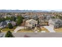Expansive aerial view of beautiful home showcasing meticulous landscaping and charming curb appeal at 5773 S Benton Way, Littleton, CO 80123