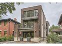 Striking townhome with two balconies offers urban living at its finest at 1895 York St, Denver, CO 80206