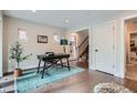 Bright home office with hardwood floors, desk, and natural light streaming in at 1895 York St, Denver, CO 80206
