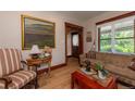 Cozy living room with hardwood floors, natural light, and vintage details throughout at 669 S Washington St, Denver, CO 80209