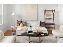 Cozy living room with stylish decor, a comfortable white sofa, and modern furnishings at 340 S Lafayette St # 201, Denver, CO 80209