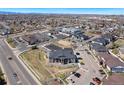 A wide aerial view of the property showcasing the neighborhood, nearby streets, and local businesses at 875 E 78Th Ave # 70, Denver, CO 80229