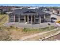 Lovely apartment building featuring stone accents, balconies, and a xeriscaped front yard at 875 E 78Th Ave # 70, Denver, CO 80229