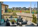 Inviting outdoor space with comfortable seating, perfect for enjoying the neighborhood views at 8733 Arriba Dr, Littleton, CO 80125