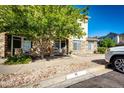 Beautiful townhome featuring stone accents, sidewalk access, and nearby parking at 452 Black Feather Loop # 608, Castle Rock, CO 80104