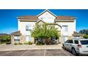 Inviting two-story townhome with well-manicured front yard and convenient parking at 452 Black Feather Loop # 608, Castle Rock, CO 80104