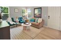 Cozy living room with stylish furnishings and ample natural light at 453 Arden Cir, Highlands Ranch, CO 80126