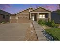 Charming single-Gathering home boasting a 3-car garage, covered porch, and well-maintained landscaping at 24028 E Caleb Pl, Aurora, CO 80016