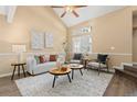 Well-lit living room with modern furnishings, neutral tones, and an inviting atmosphere at 2640 Overlook Dr, Broomfield, CO 80020