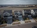 Beautiful shot of multiple homes with a scenic background at 15076 W 93Rd Ave, Arvada, CO 80007