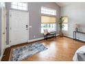 Inviting entryway with hardwood floors, natural light, and stylish decor at 257 Cherry St, Castle Rock, CO 80104