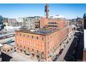 Historic brick Icehouse building with city views, featuring a unique exterior with prominent signage at 1801 Wynkoop St # 518, Denver, CO 80202