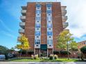 Brick building under a blue sky, professionally landscaped with a welcoming entrance at 850 20Th St # 503, Boulder, CO 80302