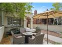 Cozy patio featuring an outdoor seating area with plush chairs, perfect for relaxing and entertaining guests at 520 Jackson St, Denver, CO 80206