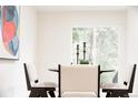 Cozy dining area with a table set for four, perfect for Gathering meals and entertaining guests at 1361 W Custer Pl, Denver, CO 80223