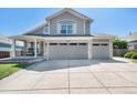 Charming two-story home featuring a two-car garage and covered porch entrance at 6833 E 115Th Ave, Thornton, CO 80233