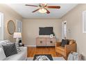 Open-concept living area with contemporary furnishings and a warm, inviting atmosphere at 2248 Lima St, Aurora, CO 80010