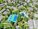 Aerial view of community amenities including pool and tennis courts at 3426 W 98Th W Dr # A, Westminster, CO 80031