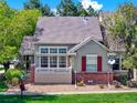 Inviting home with brick accents, awning, and well-kept landscaping at 3426 W 98Th W Dr # A, Westminster, CO 80031