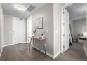 Bright and airy entryway with wood floors and console table at 4200 W 17Th Ave # 311, Denver, CO 80204