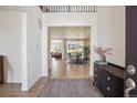 Inviting home foyer boasting an open layout with views of the dining room at 14423 Shasta Daisy Ln, Parker, CO 80134