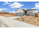 Charming single-Gathering home showcasing professional landscaping and a two-car garage at 4323 Soapberry Pl, Castle Rock, CO 80108