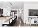 Modern kitchen featuring a spacious island, stainless steel appliances, and sleek countertops at 3488 Purcell St, Brighton, CO 80601