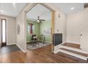 Home office featuring hardwood floors, natural light, and modern accents at 4511 Meade St, Denver, CO 80211