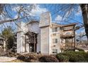 A stylish building boasts eye-catching architectural details and manicured lawns at 17505 E Mansfield Ave # 1411L, Aurora, CO 80013