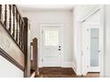 Classic entryway with hardwood floors and white door at 3044 W 29Th Ave, Denver, CO 80211