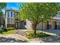 Charming townhome with lush landscaping and well-maintained curb appeal at 12925 Grant Cir # A, Thornton, CO 80241