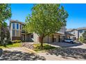 Charming townhome with lush landscaping and inviting curb appeal at 12925 Grant Cir # A, Thornton, CO 80241