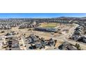Expansive aerial view of the residential area showcasing the community layout with the landscape at 1698 Odyssey Ct, Castle Rock, CO 80109