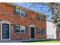 Charming brick townhouse featuring classic architectural details and a welcoming entrance at 13977 E Bails Pl, Aurora, CO 80012